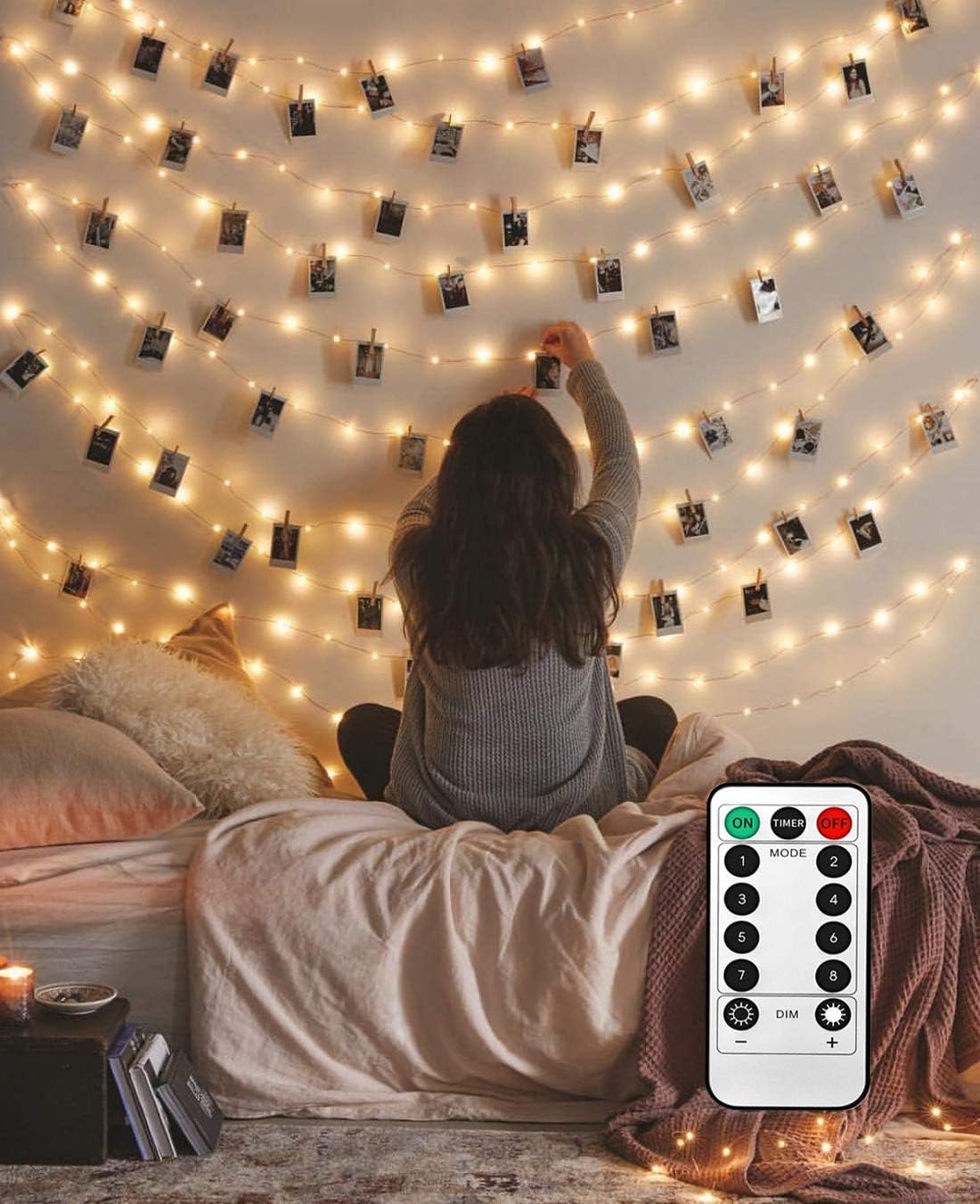 LECLSTAR photo clip lights over a bedroom photo wall