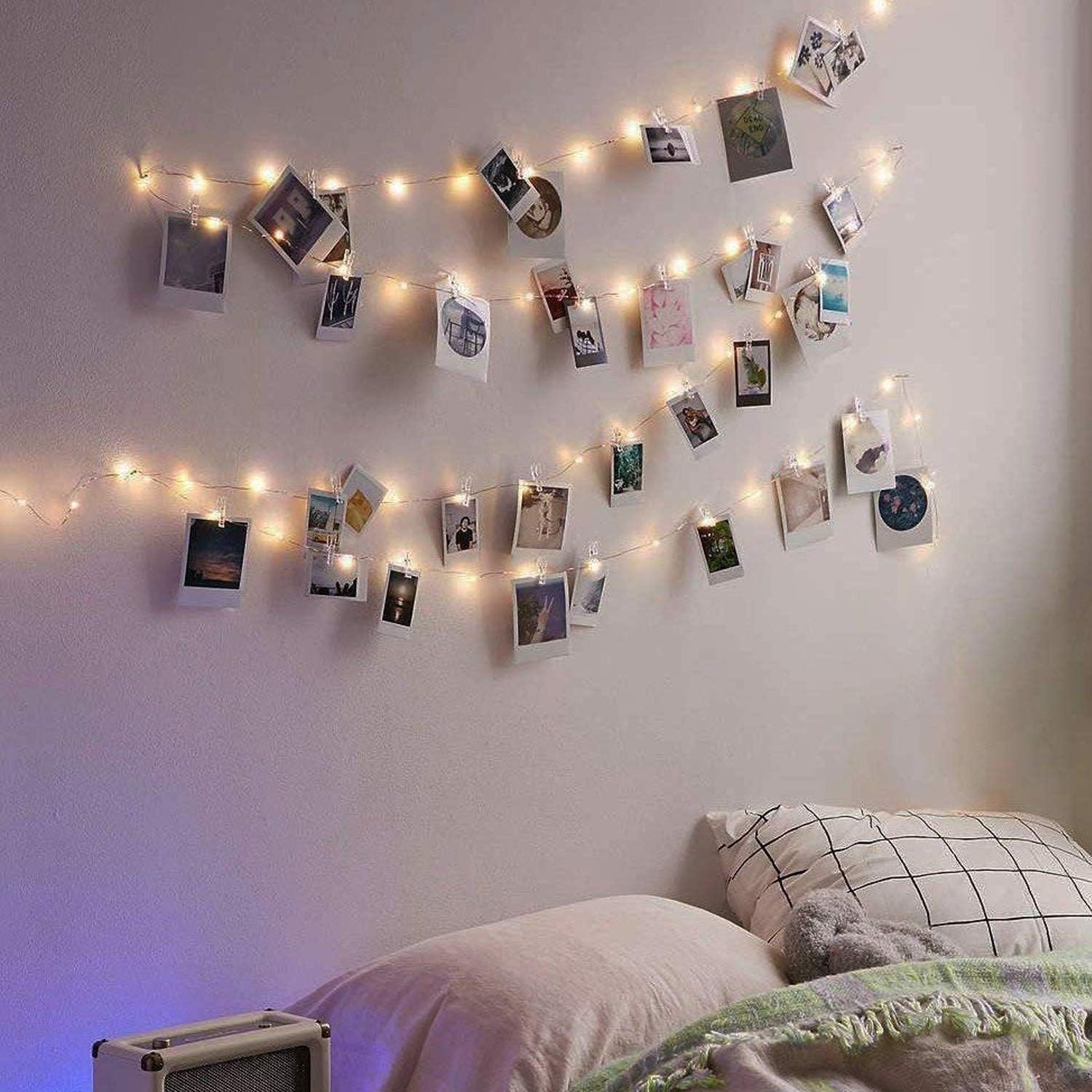 Photo clip lights in a cozy bedroom